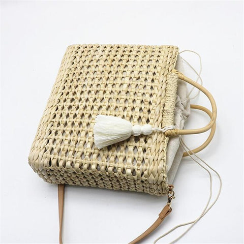 The Carena - Handwoven Straw Cross Body Bag w/Tassel Embellishment