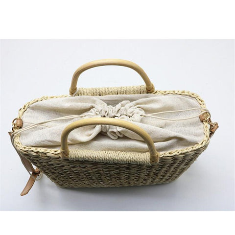The Carena - Handwoven Straw Cross Body Bag w/Tassel Embellishment